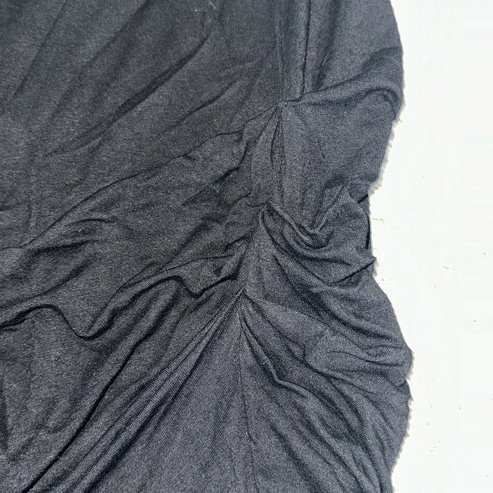 Black bodycon sleeveless dress with lace on shoulders and rushing on left side. - Picture 3 of 4
